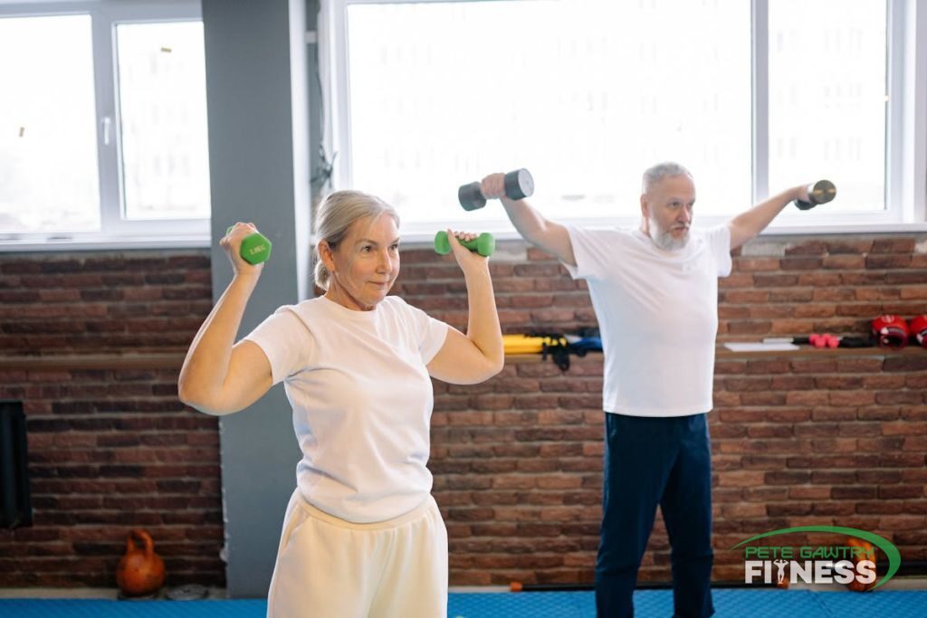 An older couple strength training together, relaxed and capable — the calm, boring habits that work, no gummies required