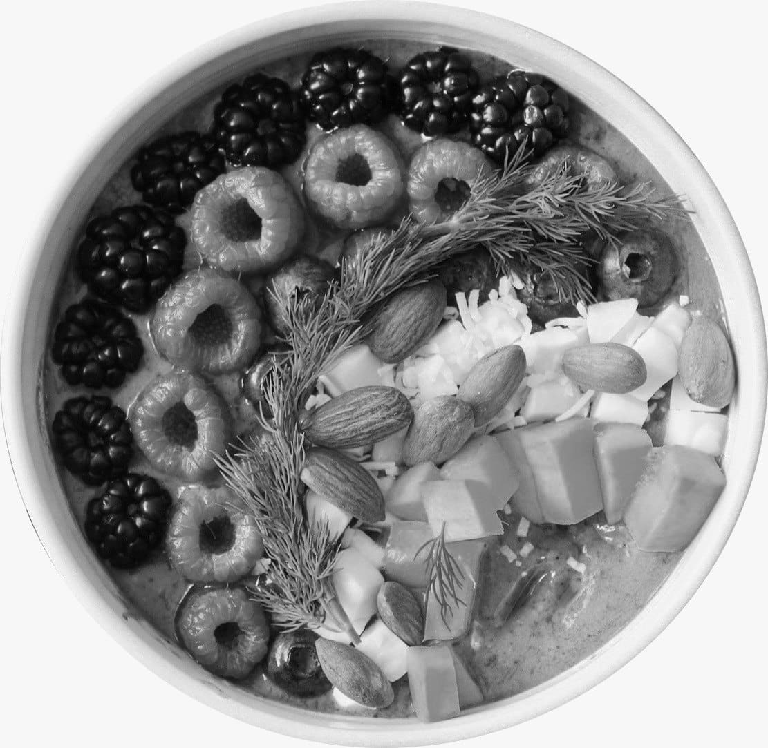 Bowl of berries, nuts and whole foods — high nutrient density